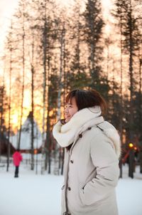 Woman in park in winter