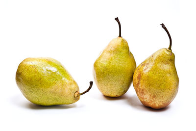 Close-up of fruits against white background