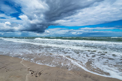 Scenic view of beach against sky