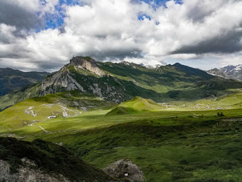 Scenic view of landscape and mountains against sky