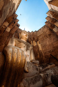 Low angle view of statue of temple