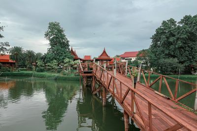 Bridge over lake against sky