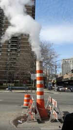 View of city against cloudy sky