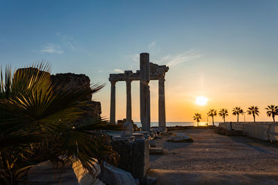 Panoramic view of ruins of ancient temple of apollo in side on sunset, alanya province, turkey. 