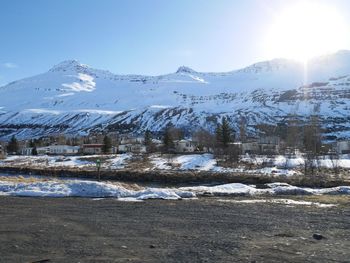 Scenic view of snowcapped mountains against sky