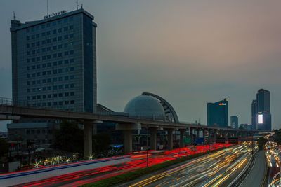 High angle view of light trails on road in city