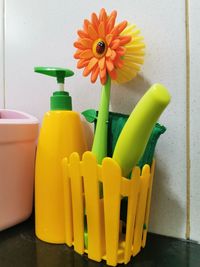 Close-up of yellow flowers on table