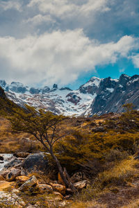 Scenic view of snowcapped mountains against sky