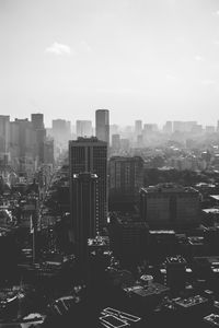 High angle view of buildings in city against sky
