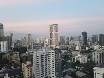 High angle view of buildings against sky during sunset