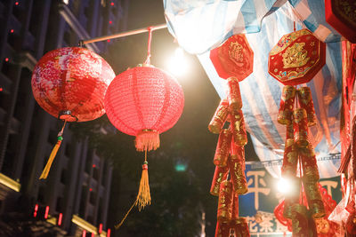Low angle view of chinese lanterns hanging at street market stall