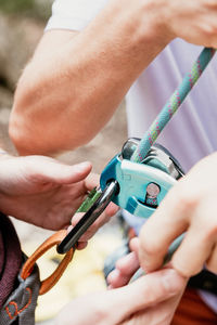 Cropped hands of doctor examining patient