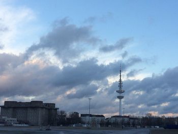 City street against cloudy sky