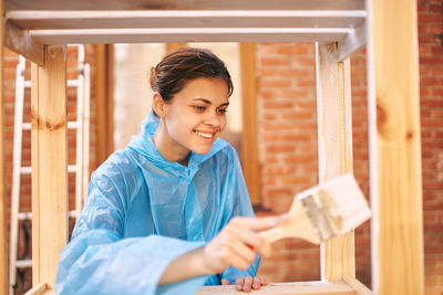 Young woman using mobile phone