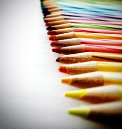 Close-up of colored pencils on table