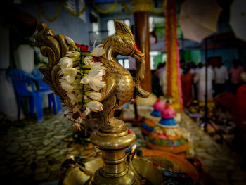 Close-up of diya in temple