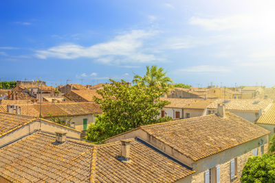 Red roofs of old european houses in soft sunlight