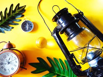 High angle view of clock on table