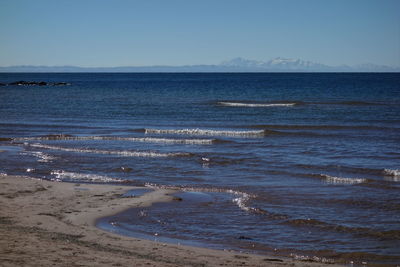 Scenic view of sea against clear sky