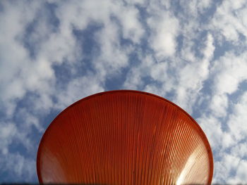 Low angle view of gate lamp against sky