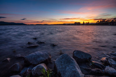 Scenic view of sea against sky during sunset