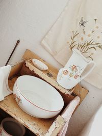 High angle view of bread on white table
