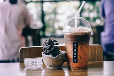 Close-up of drink in jar on table