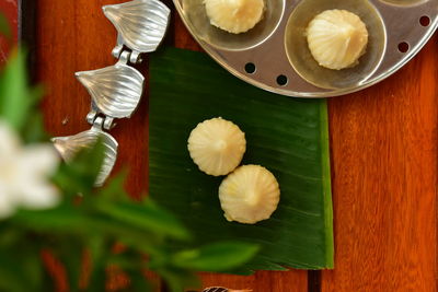 High angle view of fruits in plate on table
