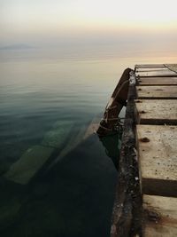 Close-up of sea against sky during sunset