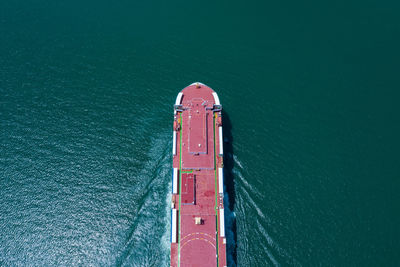 High angle view of red boat on sea