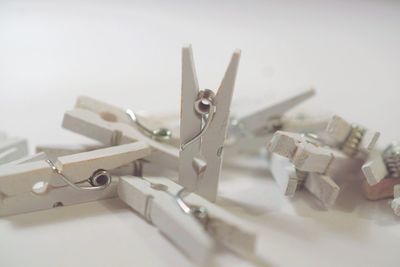 High angle view of clothespins on table