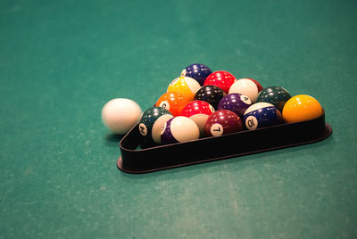 Close-up of pool balls on table