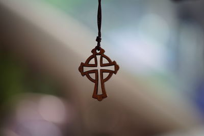 Close-up of chain hanging on metal