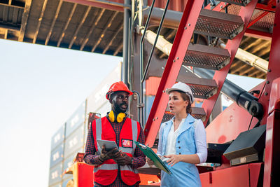 Rear view of man working at construction site