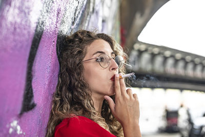 Young woman drinking water