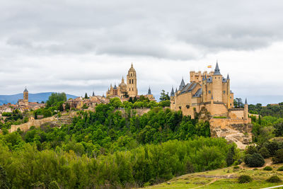 Historic building against cloudy sky