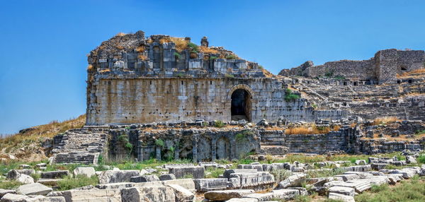 Old ruins of temple against clear sky