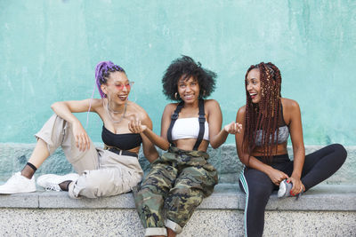 Young women sitting outdoors