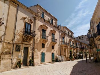 Low angle view of buildings in town