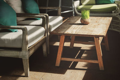 High angle view of empty chairs and table in cafe