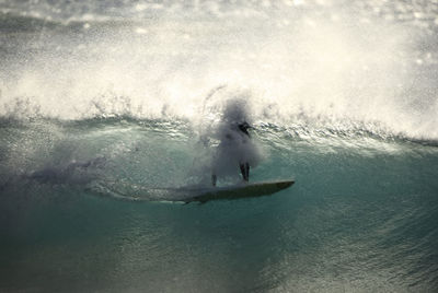 Man surfing in sea