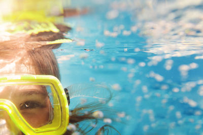 Close-up of girl swimming