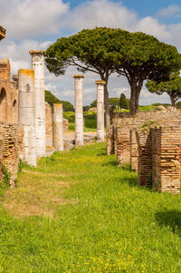 View of old ruins against cloudy sky