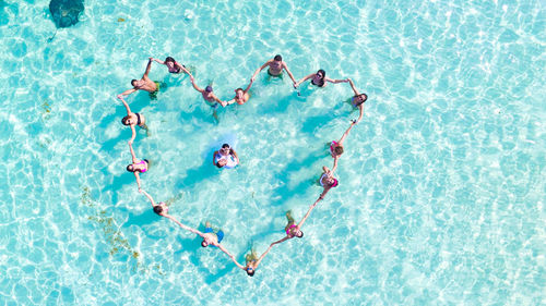 High angle view of man swimming in water