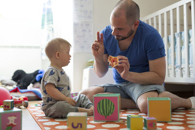 Father playing with son