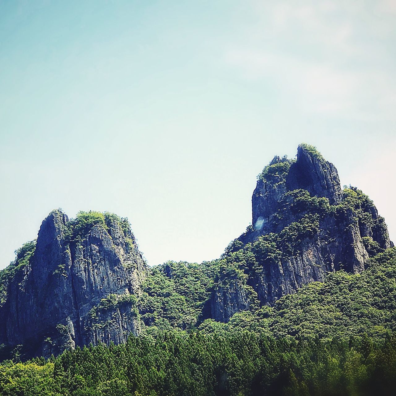 LOW ANGLE VIEW OF ROCK FORMATION ON LAND AGAINST SKY