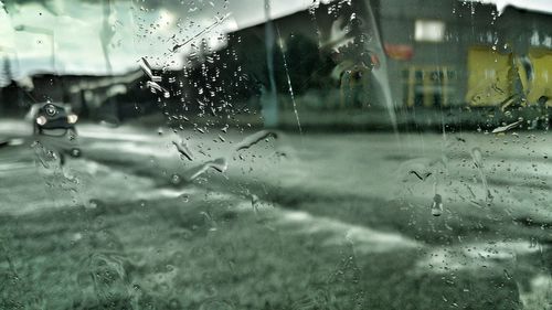 Close-up of water drops on glass