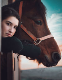 Portrait of woman with horse