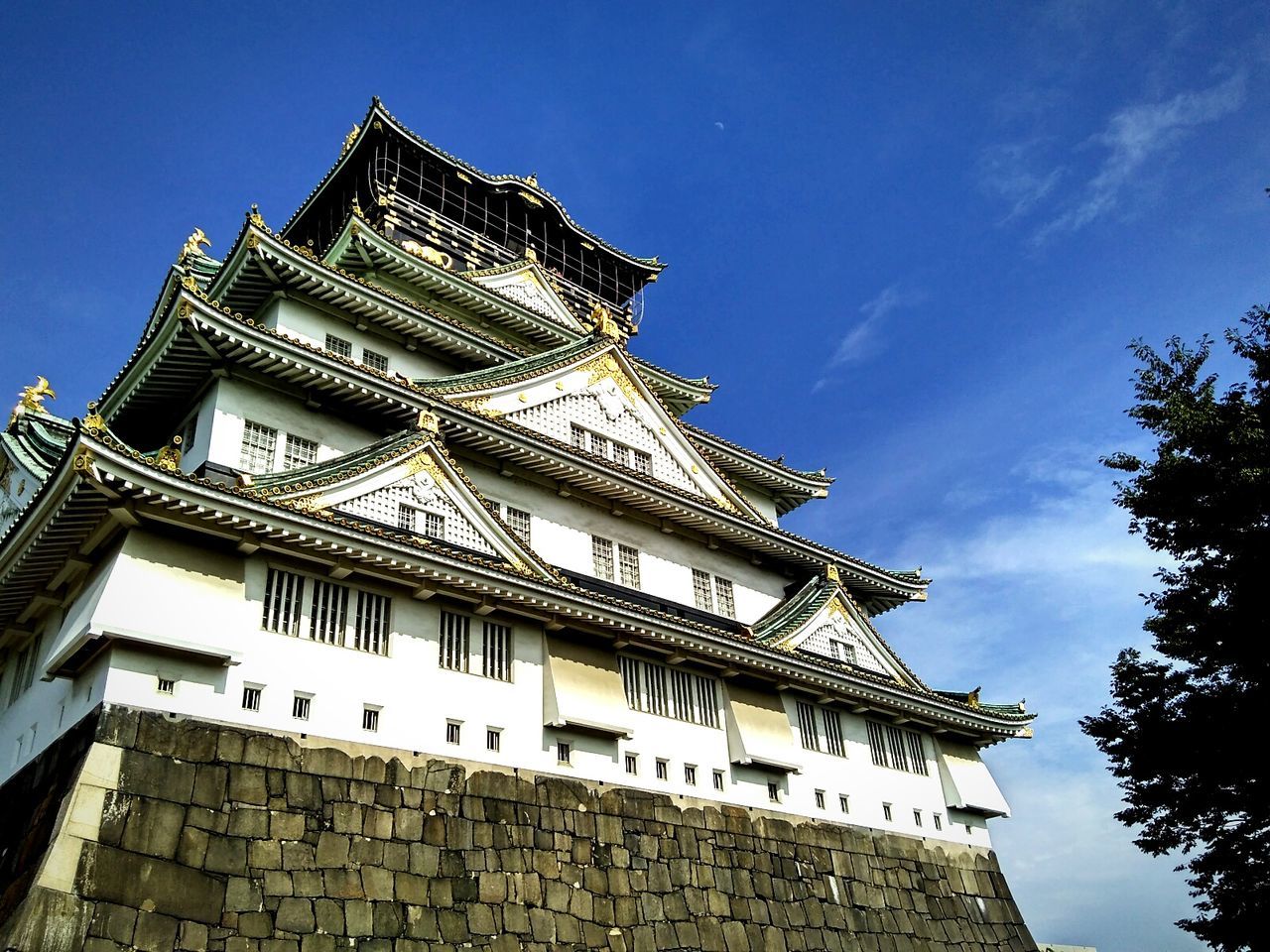 architecture, low angle view, built structure, building exterior, place of worship, famous place, history, sky, travel destinations, blue, tourism, day, outdoors, capital cities, no people, architectural feature, ornate