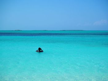 Scenic view of sea against blue sky